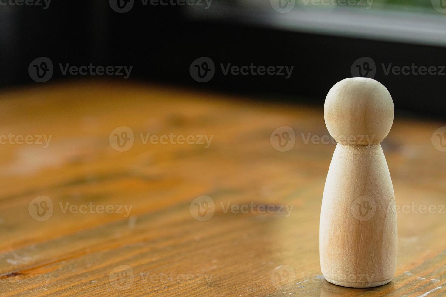 Wooden figure doll 1 piece. The idea of working alone to be successful. photo