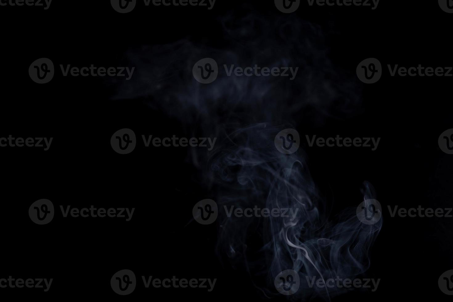 white smoke on a black background photo