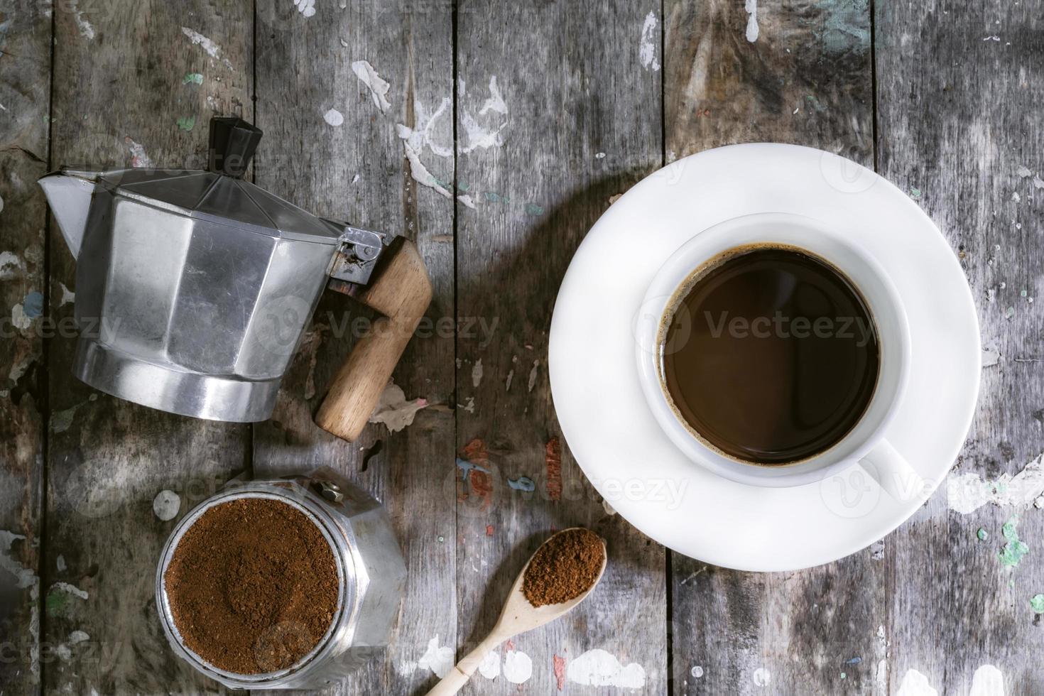 Espresso coffee morning homemade has bean moka pot on wood table. photo