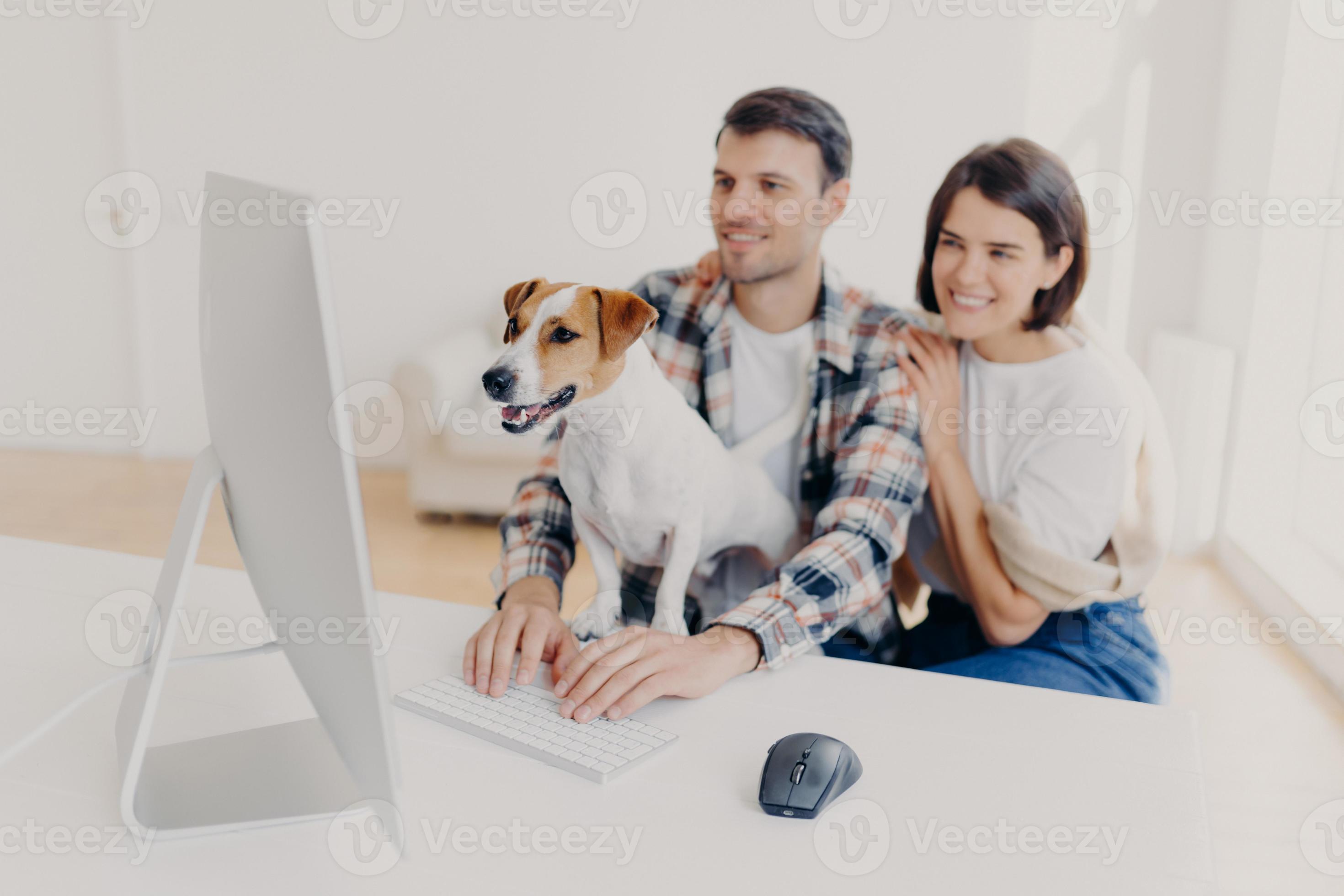 Positive young wife and husband read