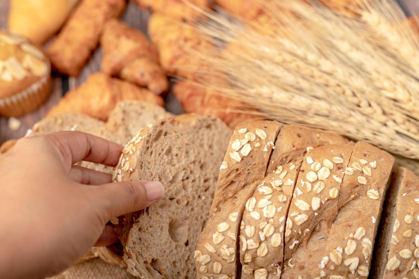 Hand women take gold corn bread photo