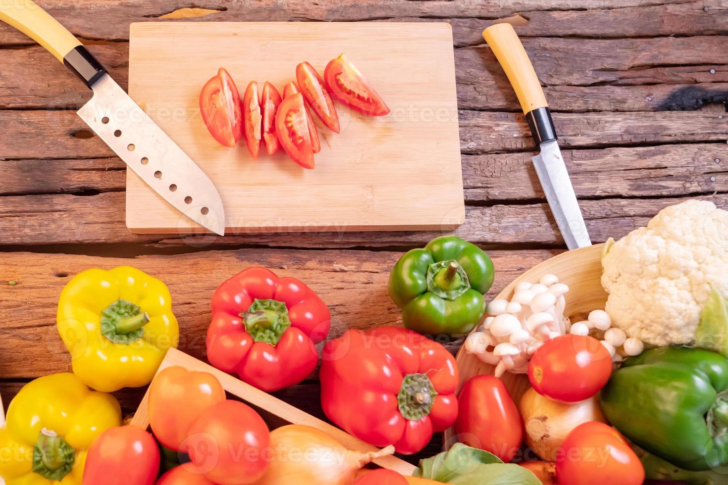Top view tomato slice on the cutting board photo