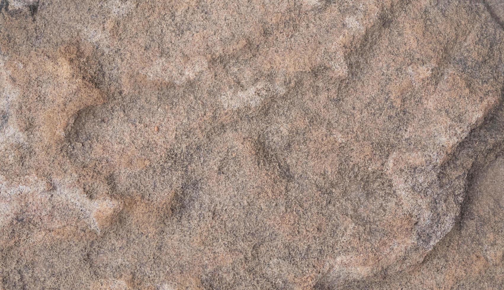 Texture and abstract background of brown stone floor photo