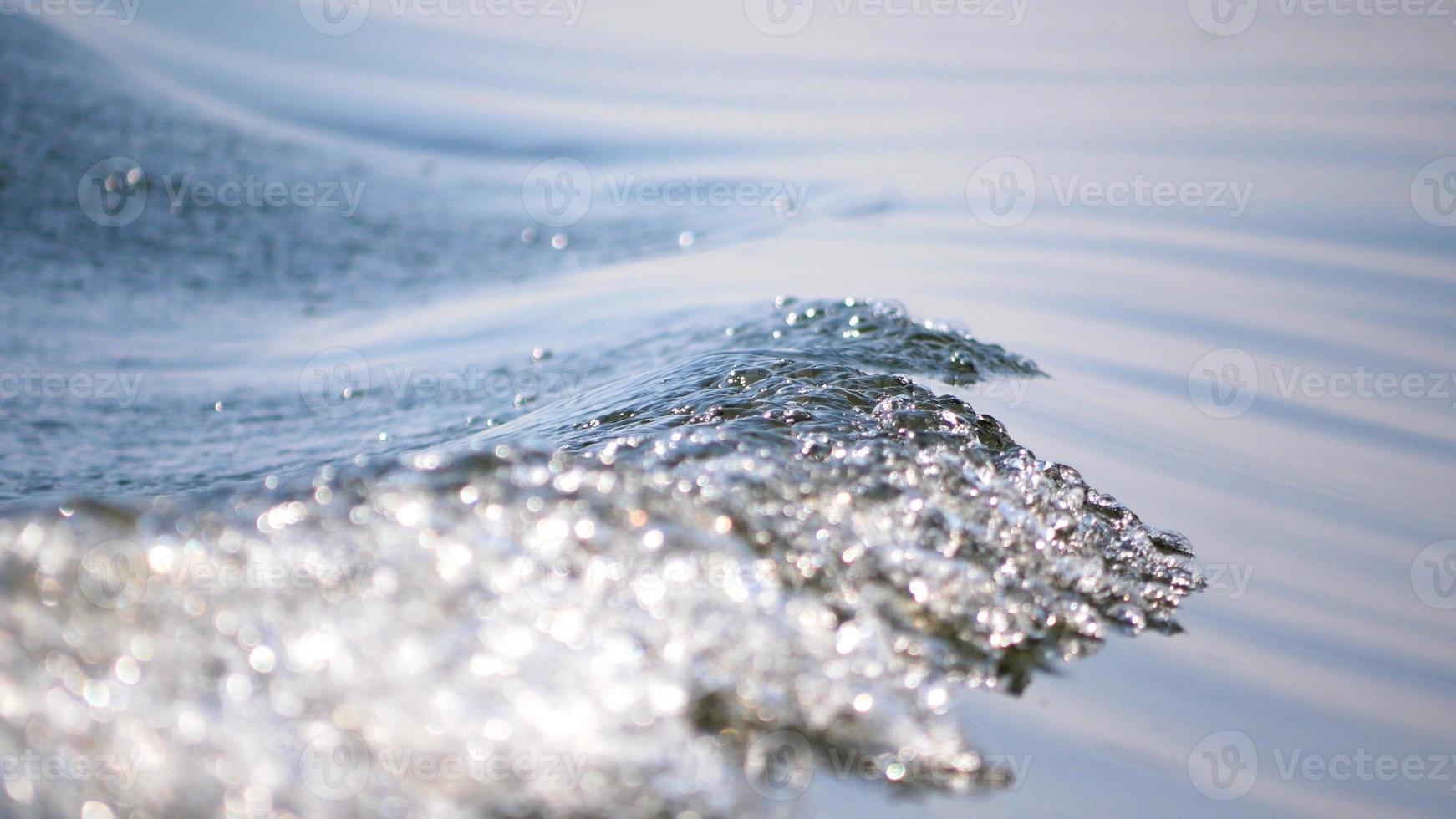 fondo abstracto y textura de la onda de agua en movimiento foto