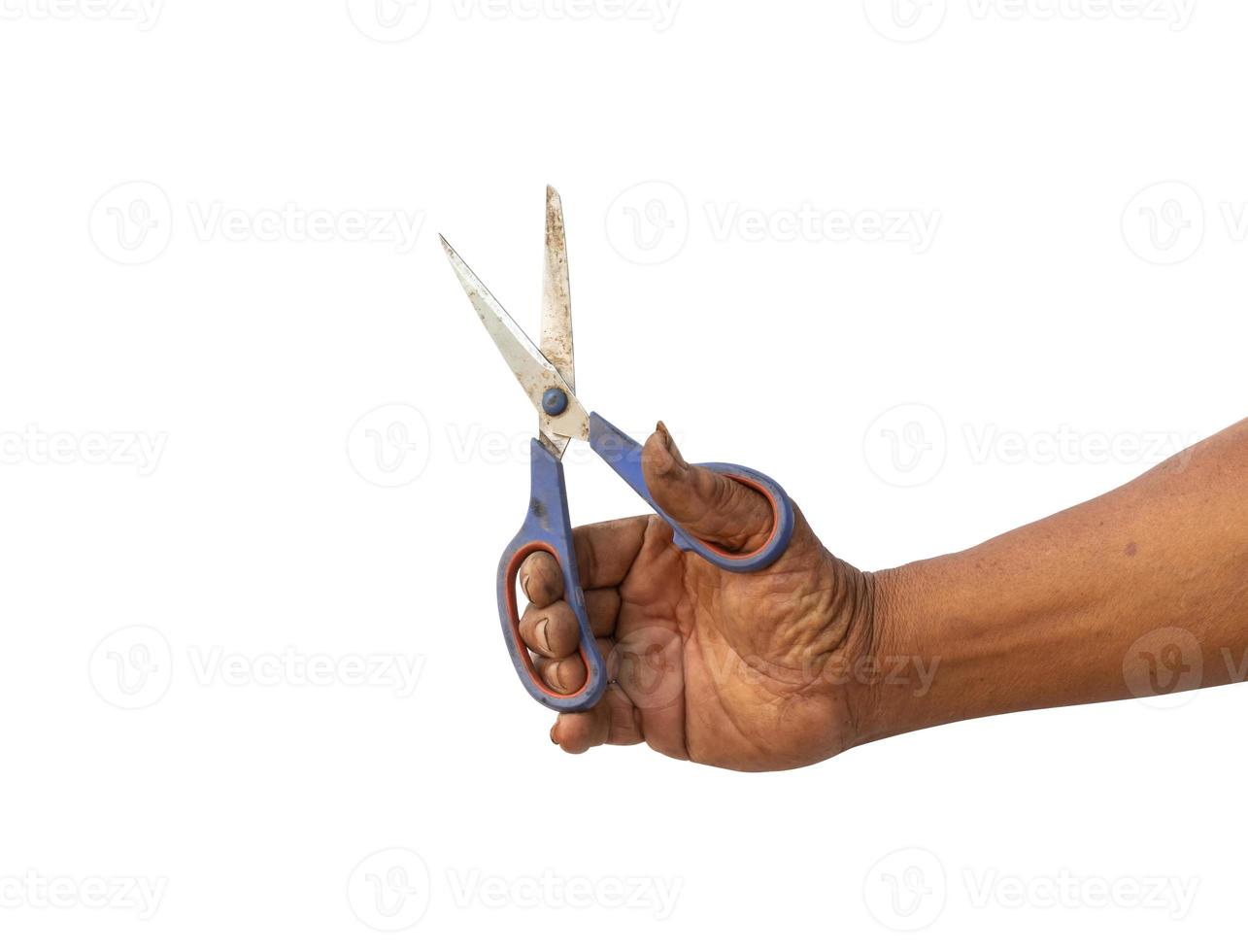 hand of a man used scissors cutting something isolated photo