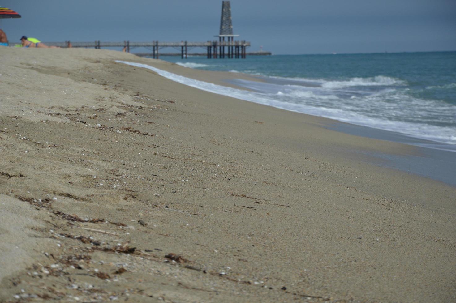 Beach waves and sand photo