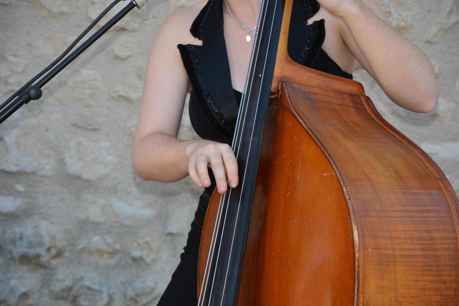 Female playing double bass photo