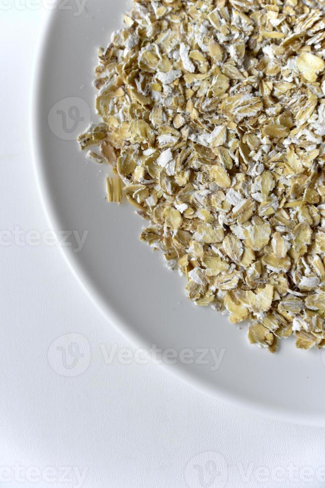 Oatmeal close-up on a white background photo