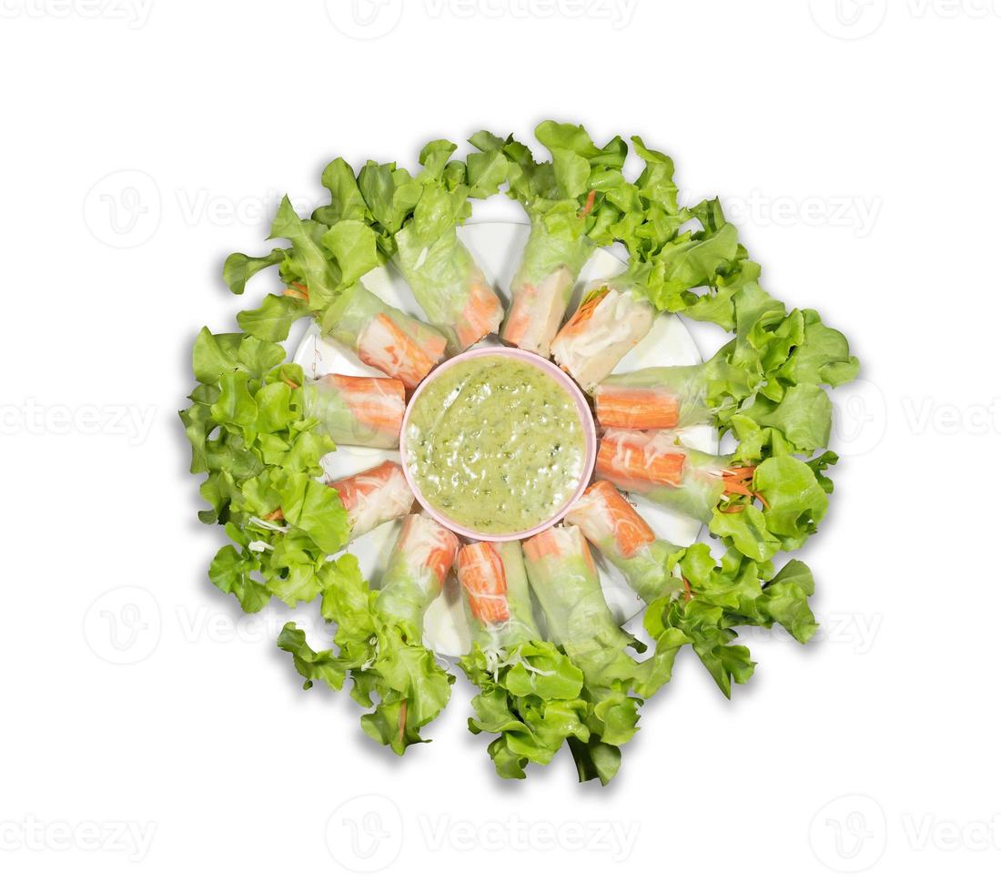 Top view salad rolls in dish on the white background photo
