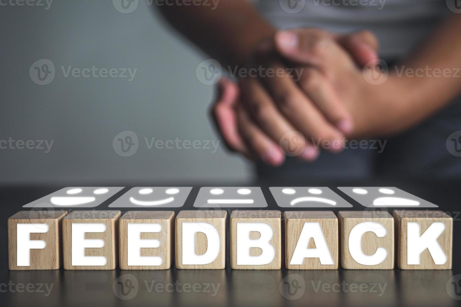 Welcome gesture of Receptionist with feedback blocks and emoji face. photo