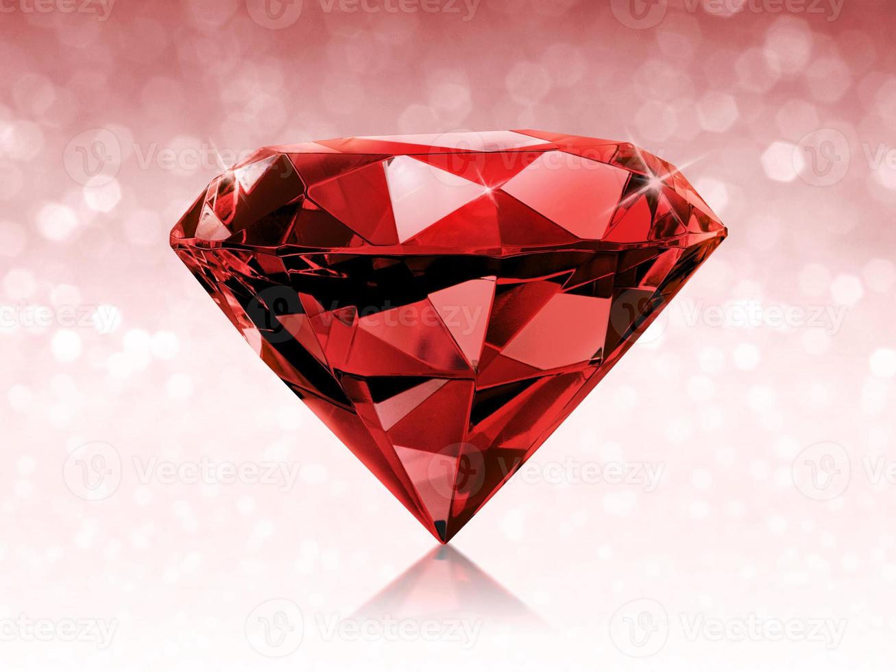 Dazzling diamond red on red shining bokeh background. concept for chossing best diamond gem design photo