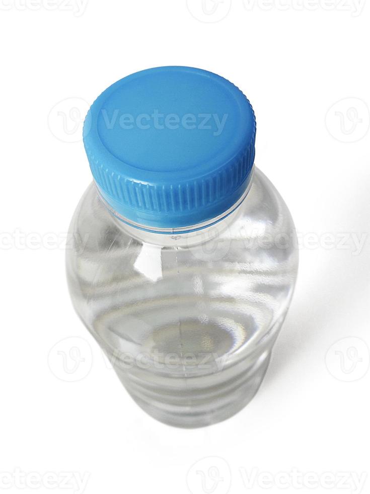 Empty clean and clear water bottle isolated on with isolated on a white background photo