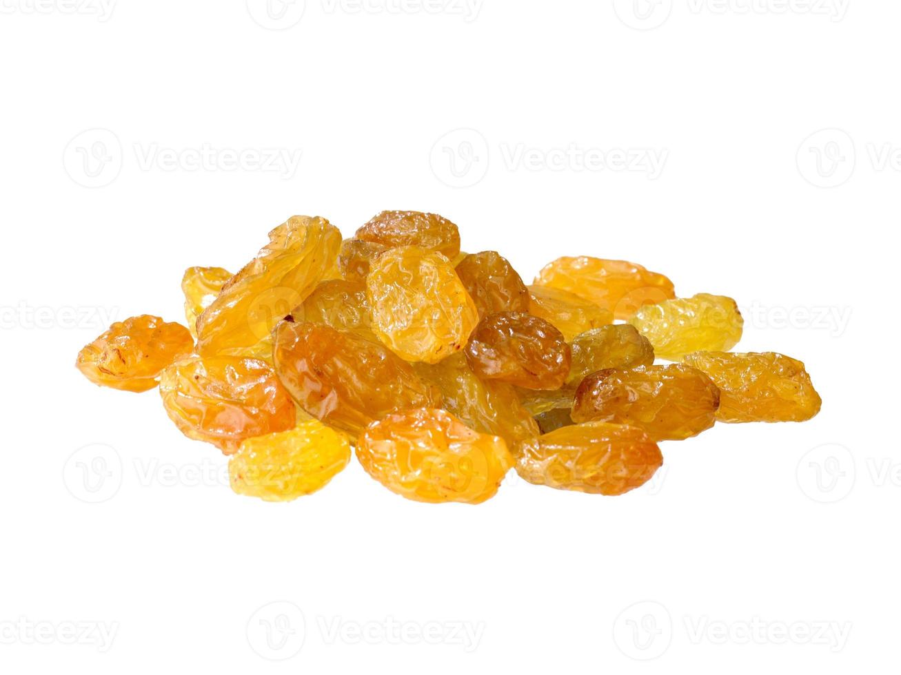 Dried golden raisins isolated on white background, close up photo