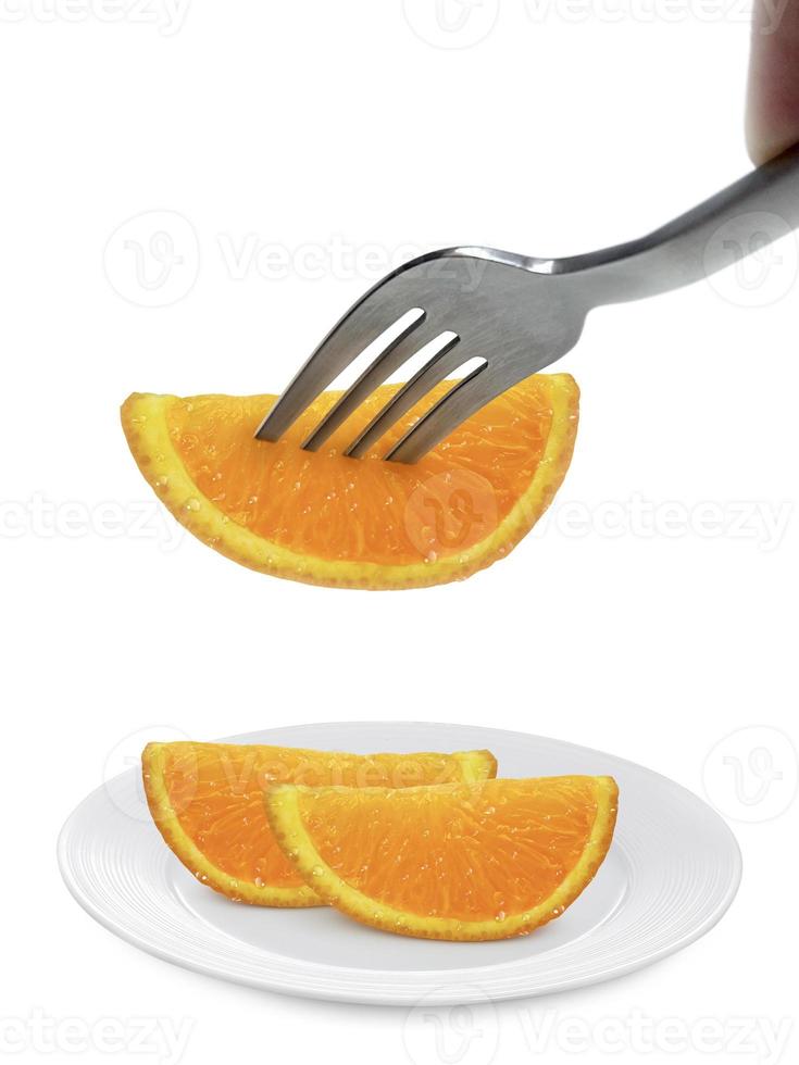 Orange fruit on dish and fork isolated on white background photo