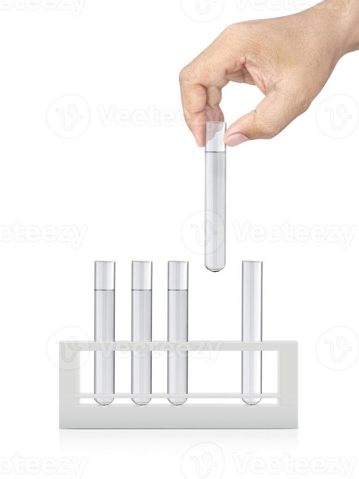 chemical test tube in hand on white isolated background photo