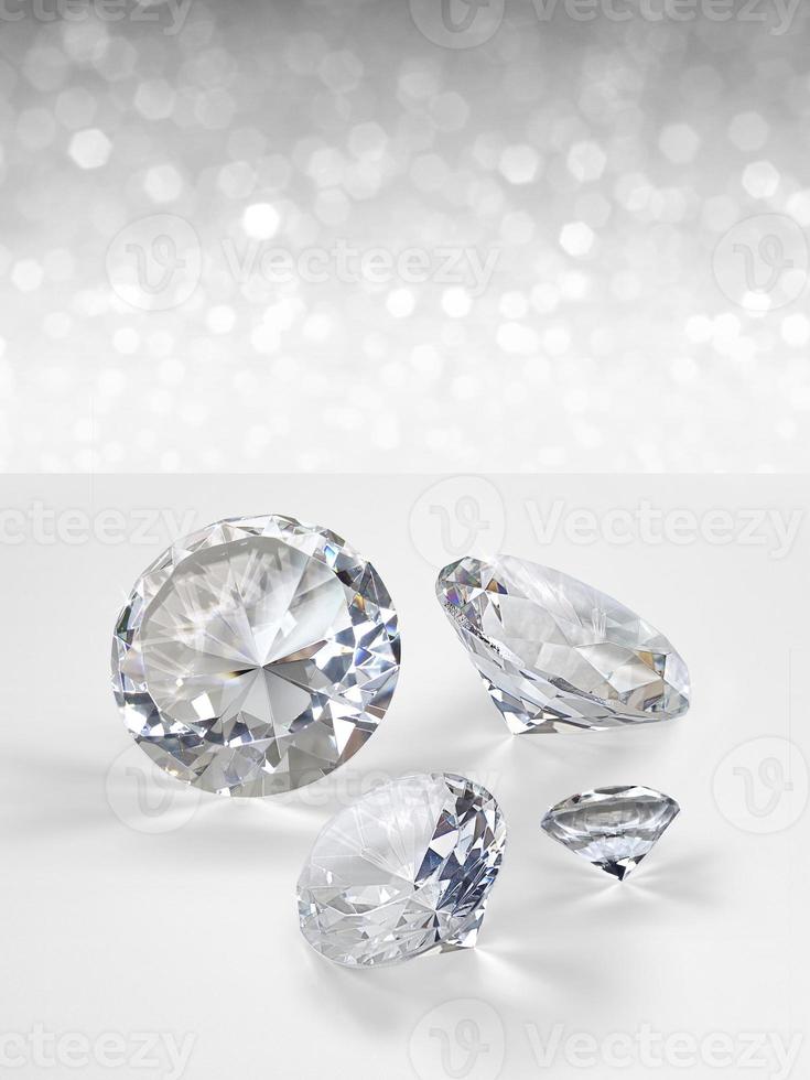 Diamonds group of placed on white shining bokeh background. concept for selection best diamond gem design photo