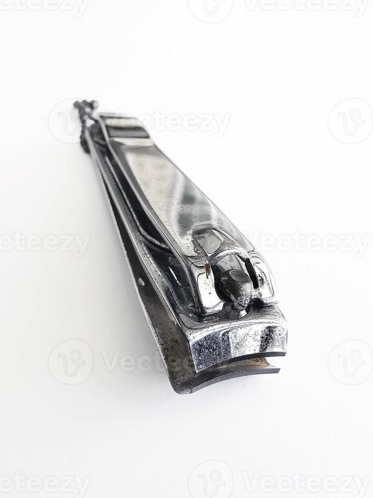 Nail clippers isolated on white background photo