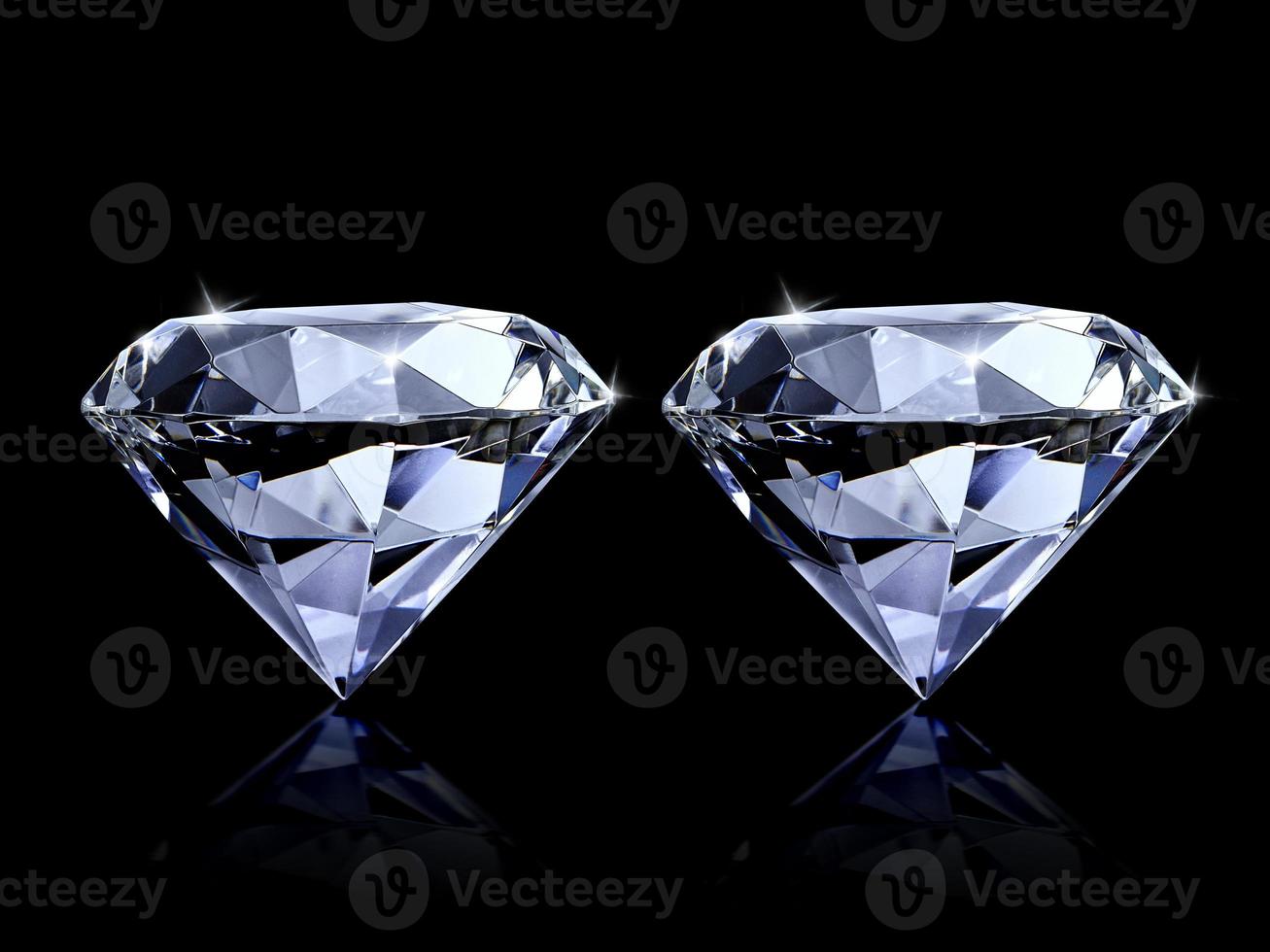 Dazzling diamond on black background photo