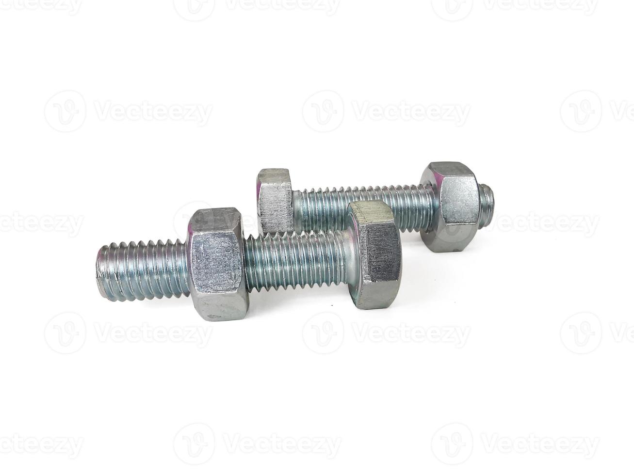 Nut and screw on hand on white background photo