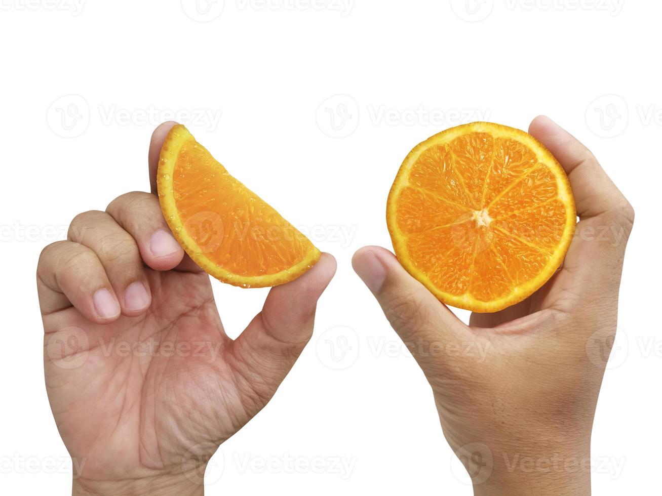 hand holding slice of orange isolated on white background photo