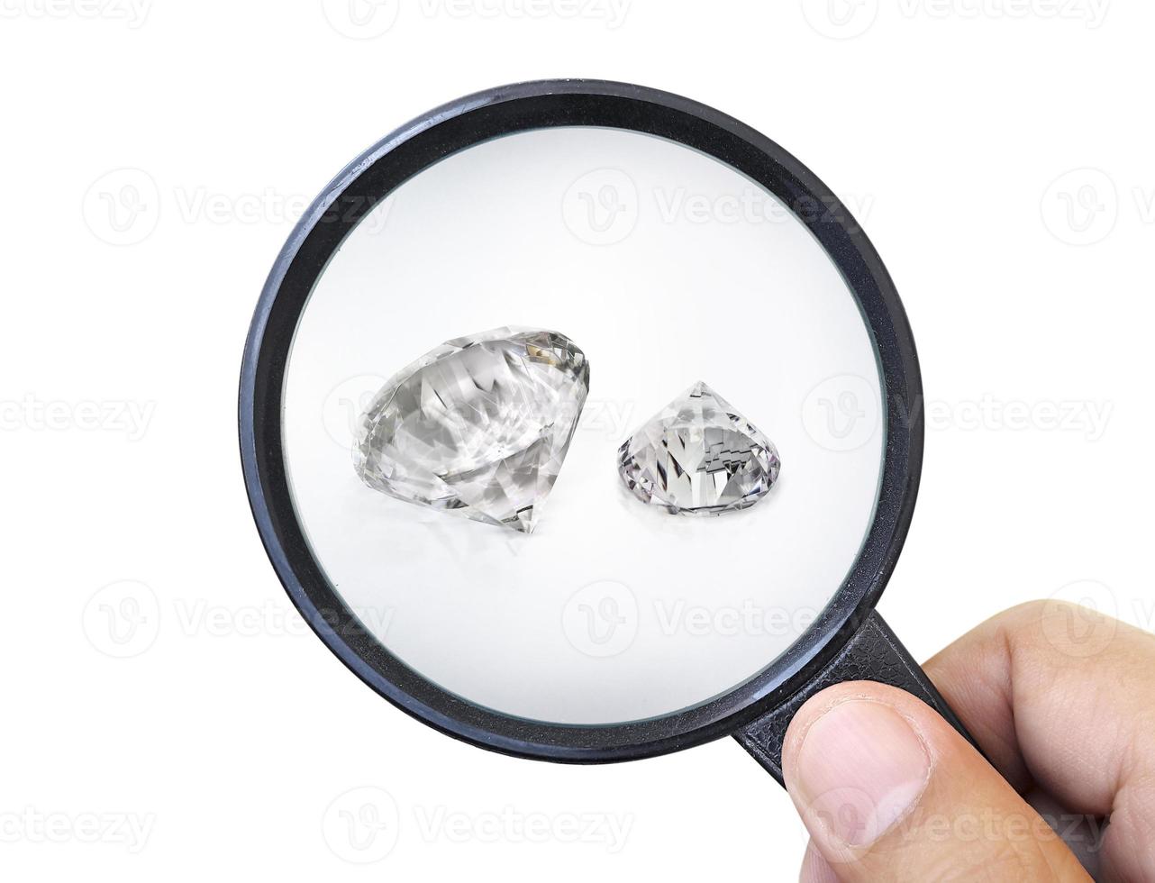 Gem stones. Jeweller checking polished diamond. Carat size diamonds. Diamond trading and dealing. Loose diamond grading. Precious stones photo