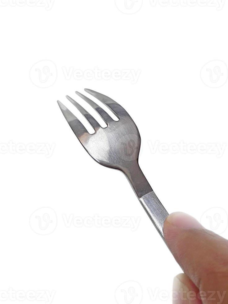 Fork in hand on white background photo