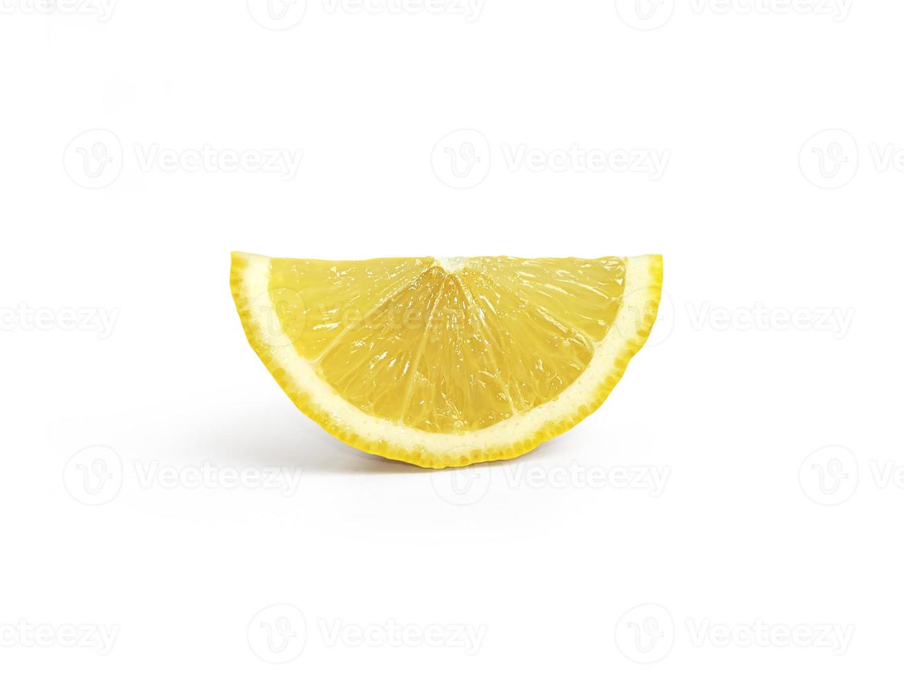 Ripe slice of yellow lemon citrus fruit isolated on white background with clipping path photo