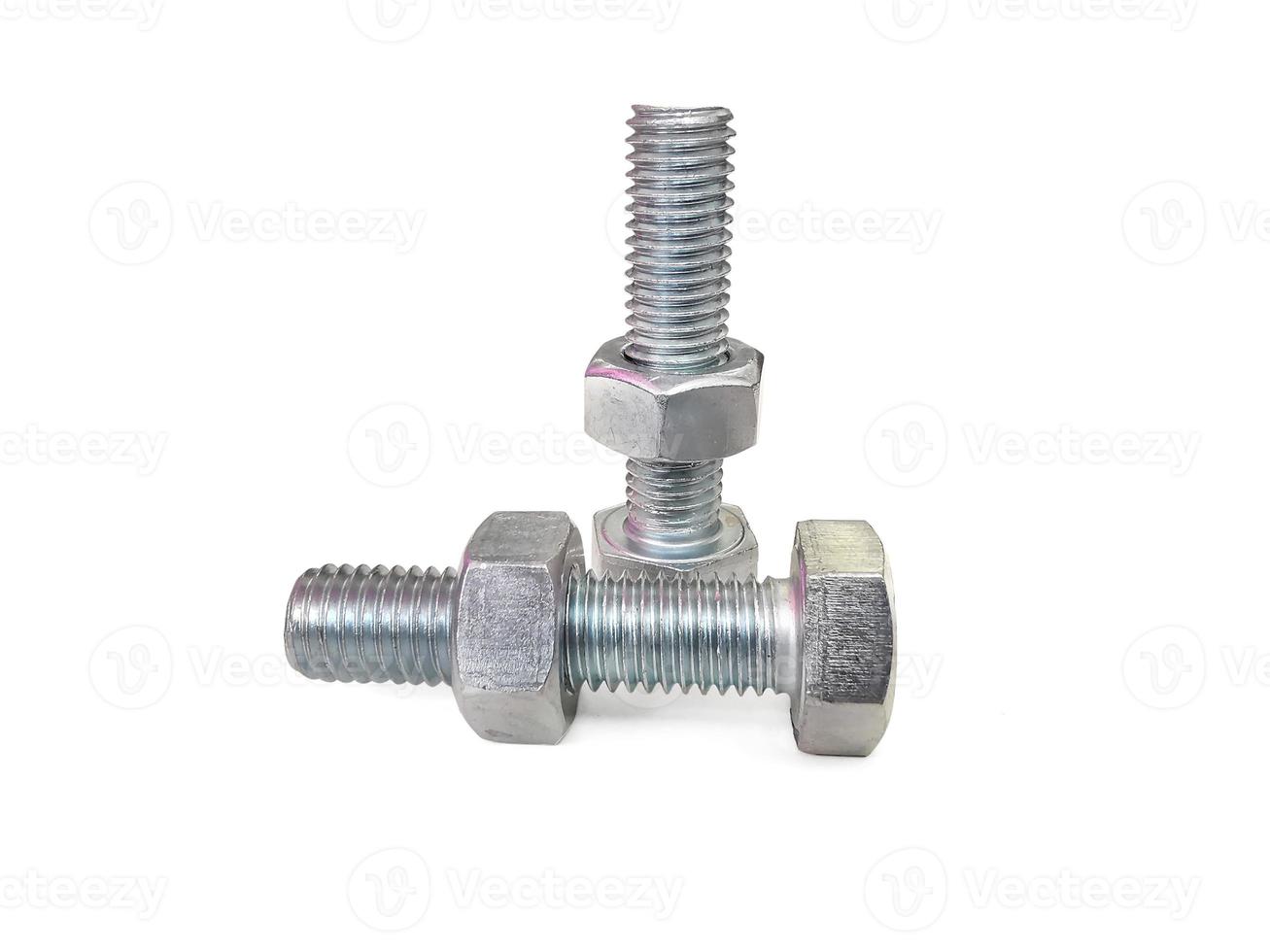 Nut and screw on hand on white background photo