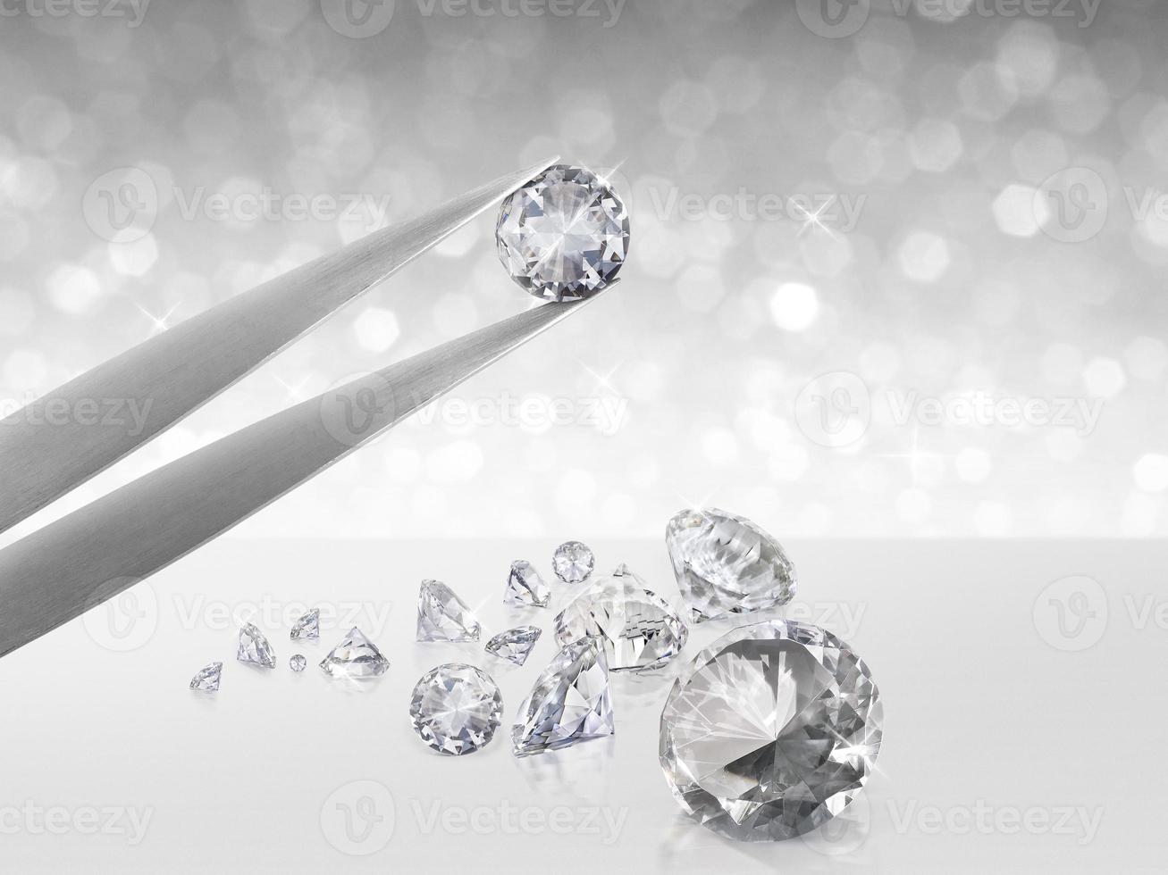 Dazzling diamond held in tweezers on a bokeh background photo