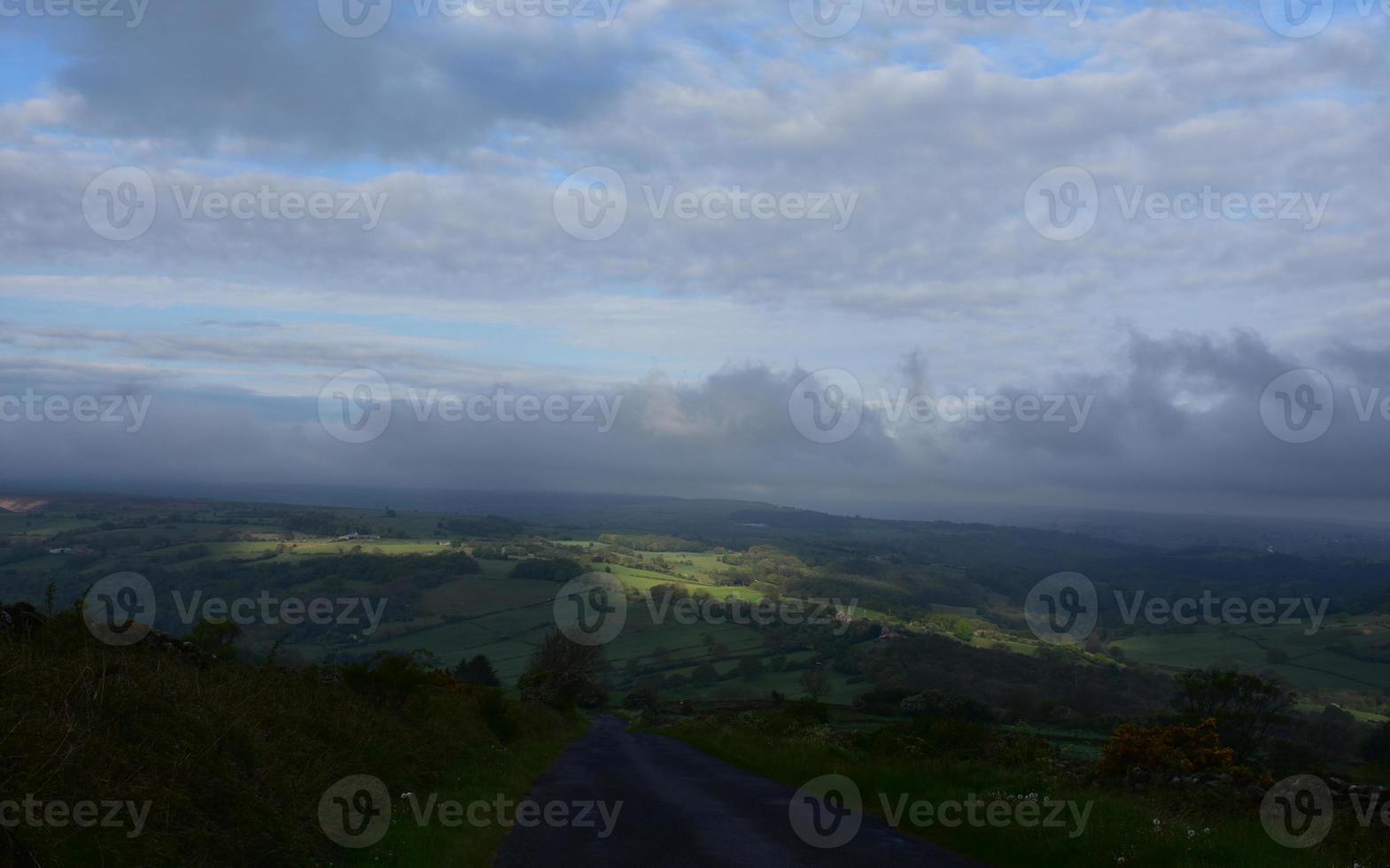 Dark Clouds Blanketing a Valley in England photo