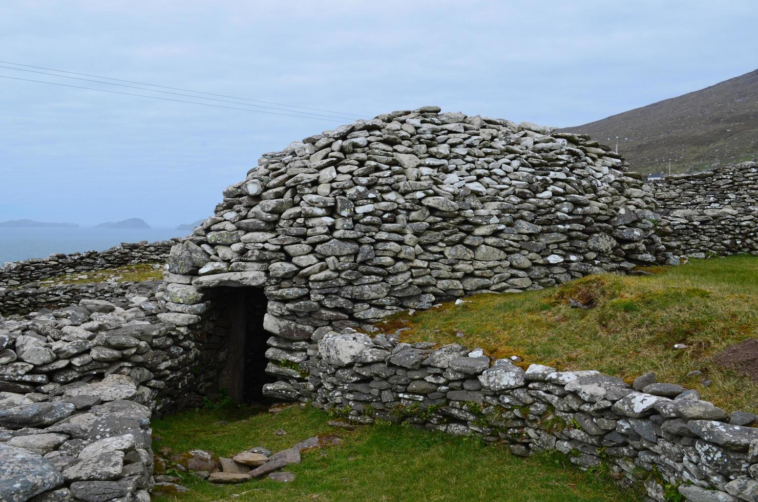 Ancient Beehive Huts in Ireland photo