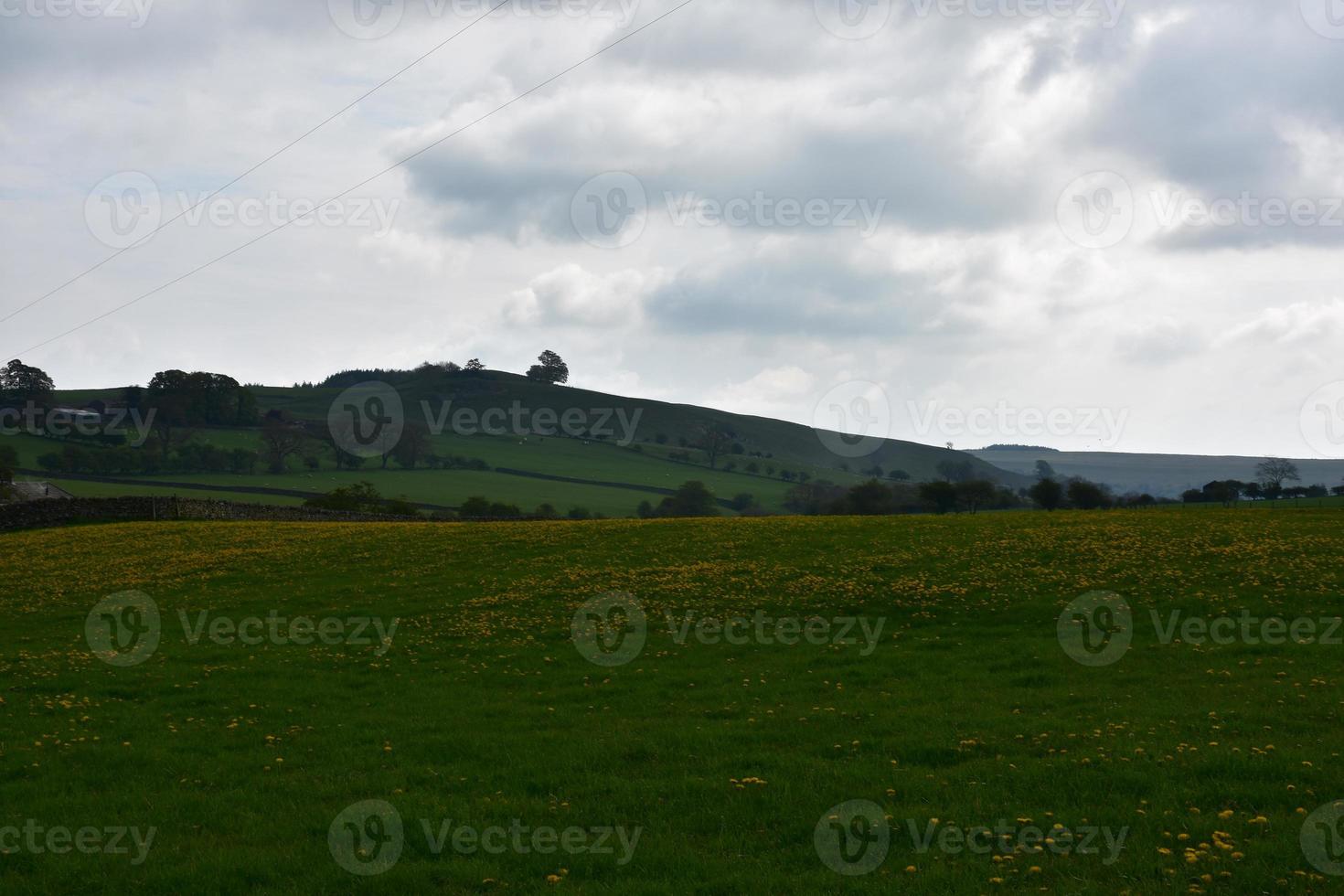 Rolling Hills Under Cloudy Skies in England photo