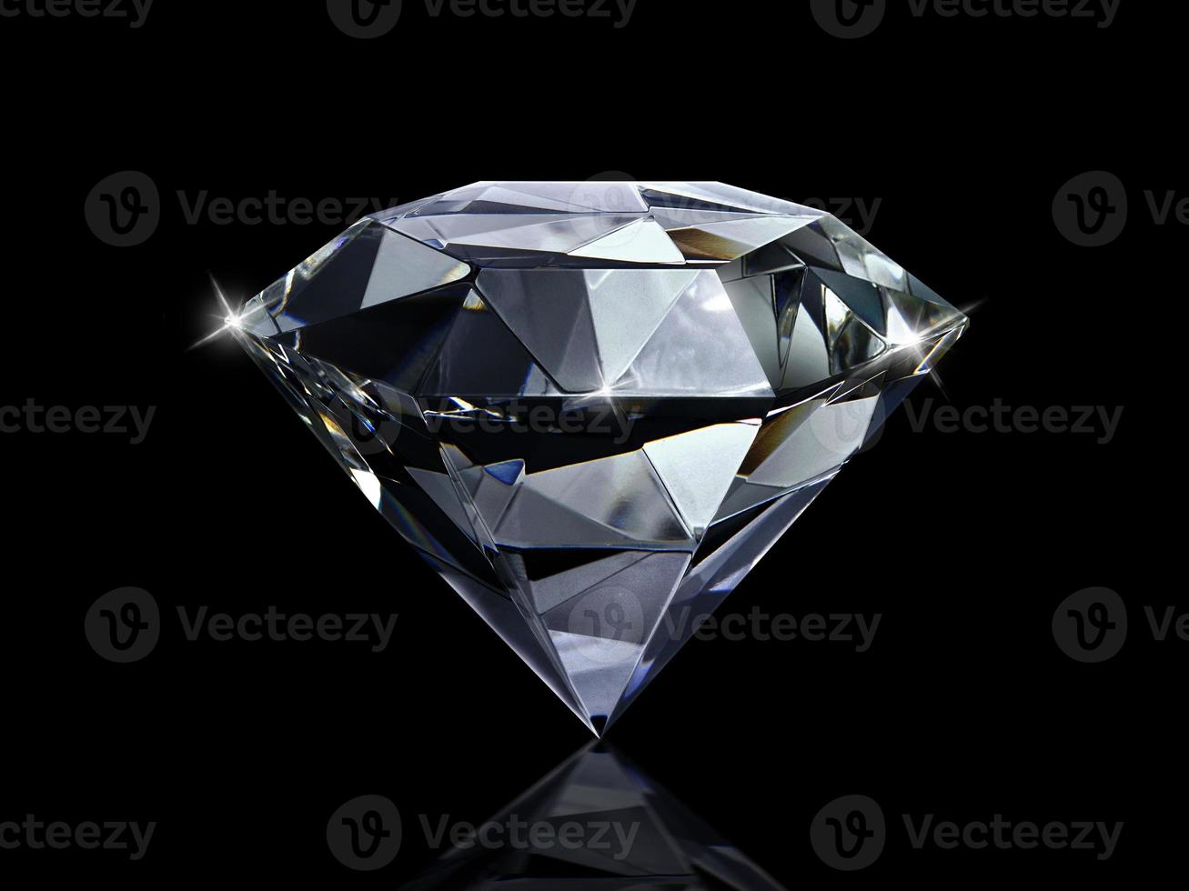 Dazzling diamond on black background photo