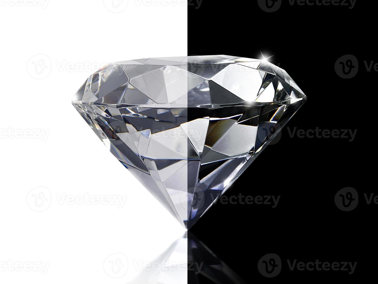 Concept creative idea. Dazzling diamond on white and black background photo