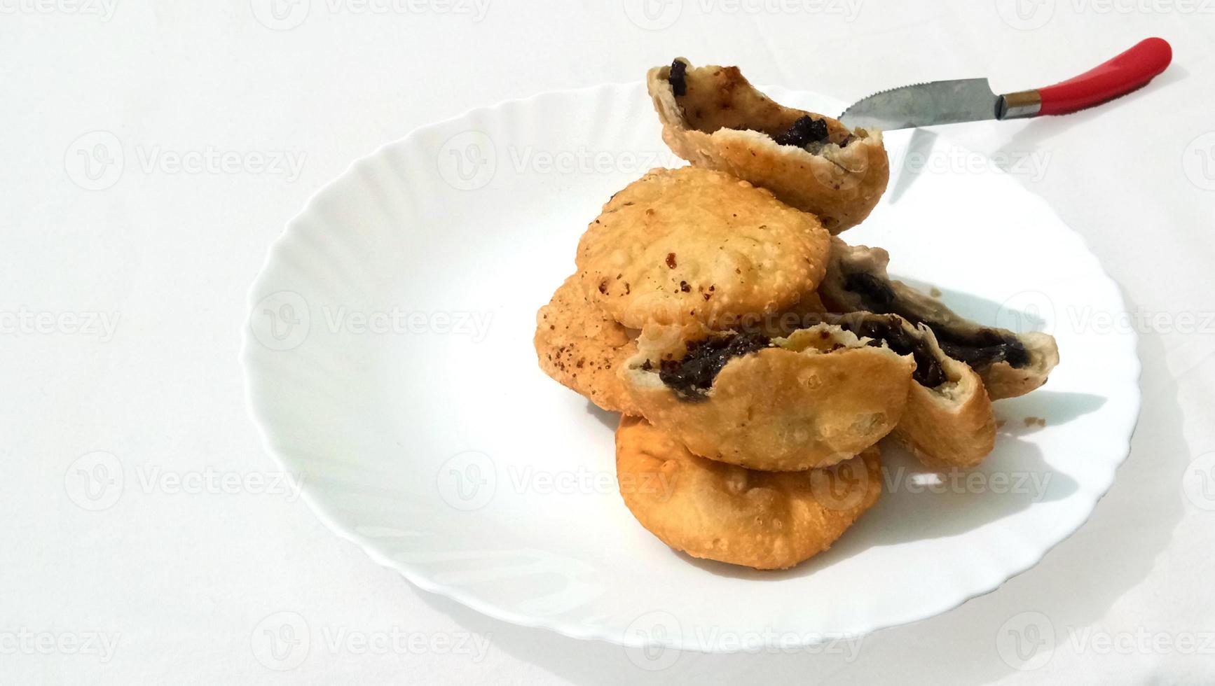 Indian special traditional matar or green peas Kachori served with tomato sauce and hot tea photo