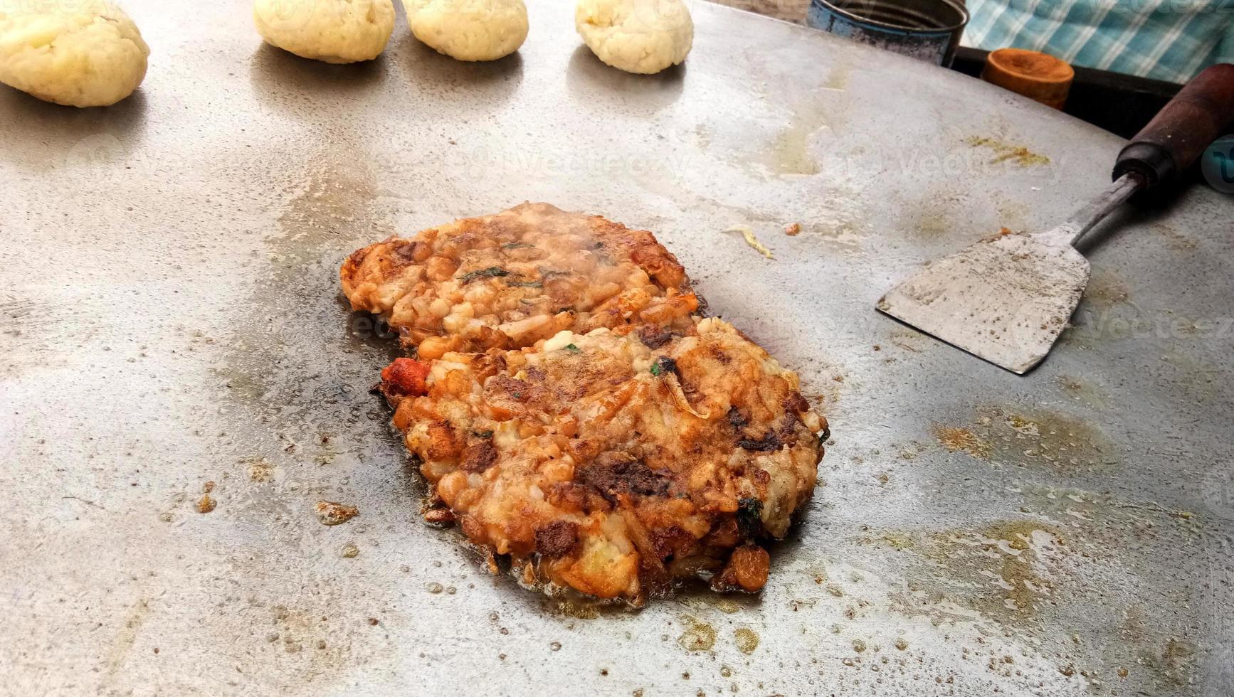 Aloo tikki fried potato cutlets, famous indian street food. photo