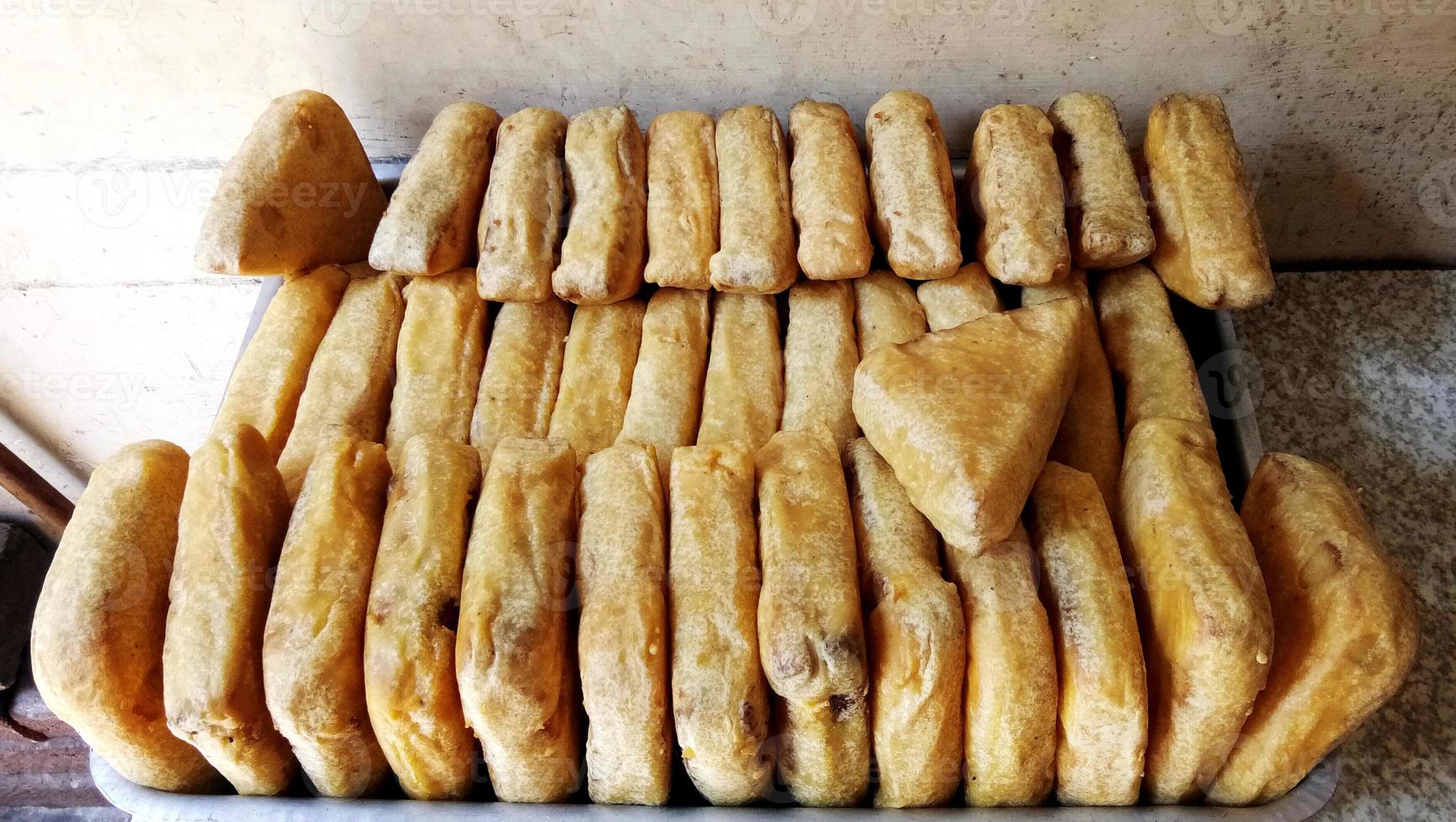 Indian food bread pakode on sale for serving photo