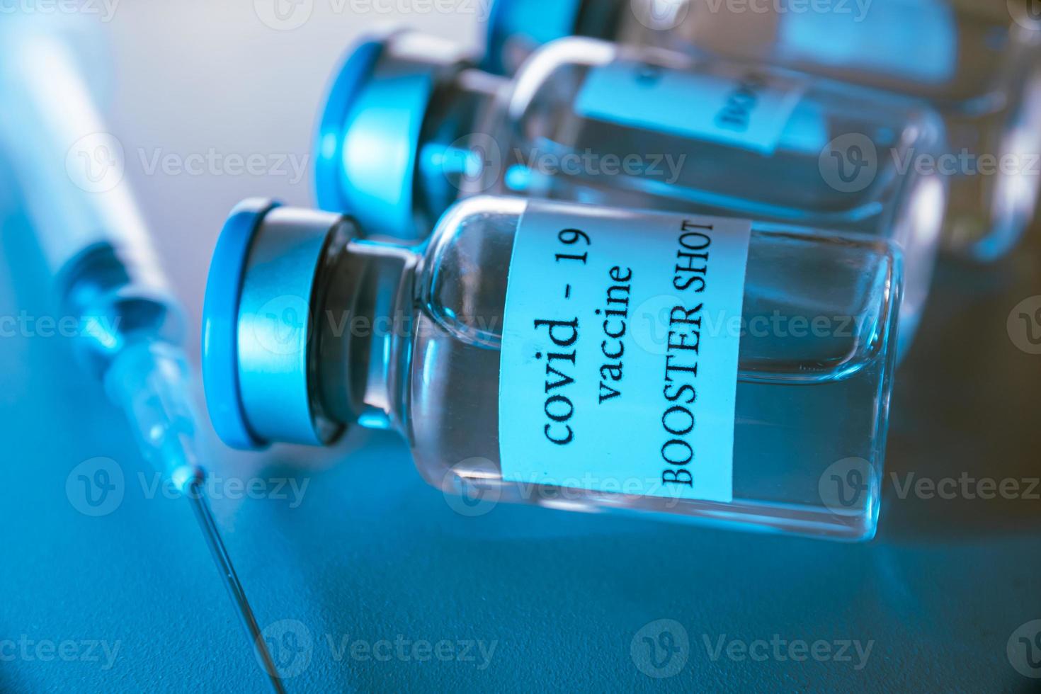 COVID-19 booster vaccine vials. Medicine and health care concept photo