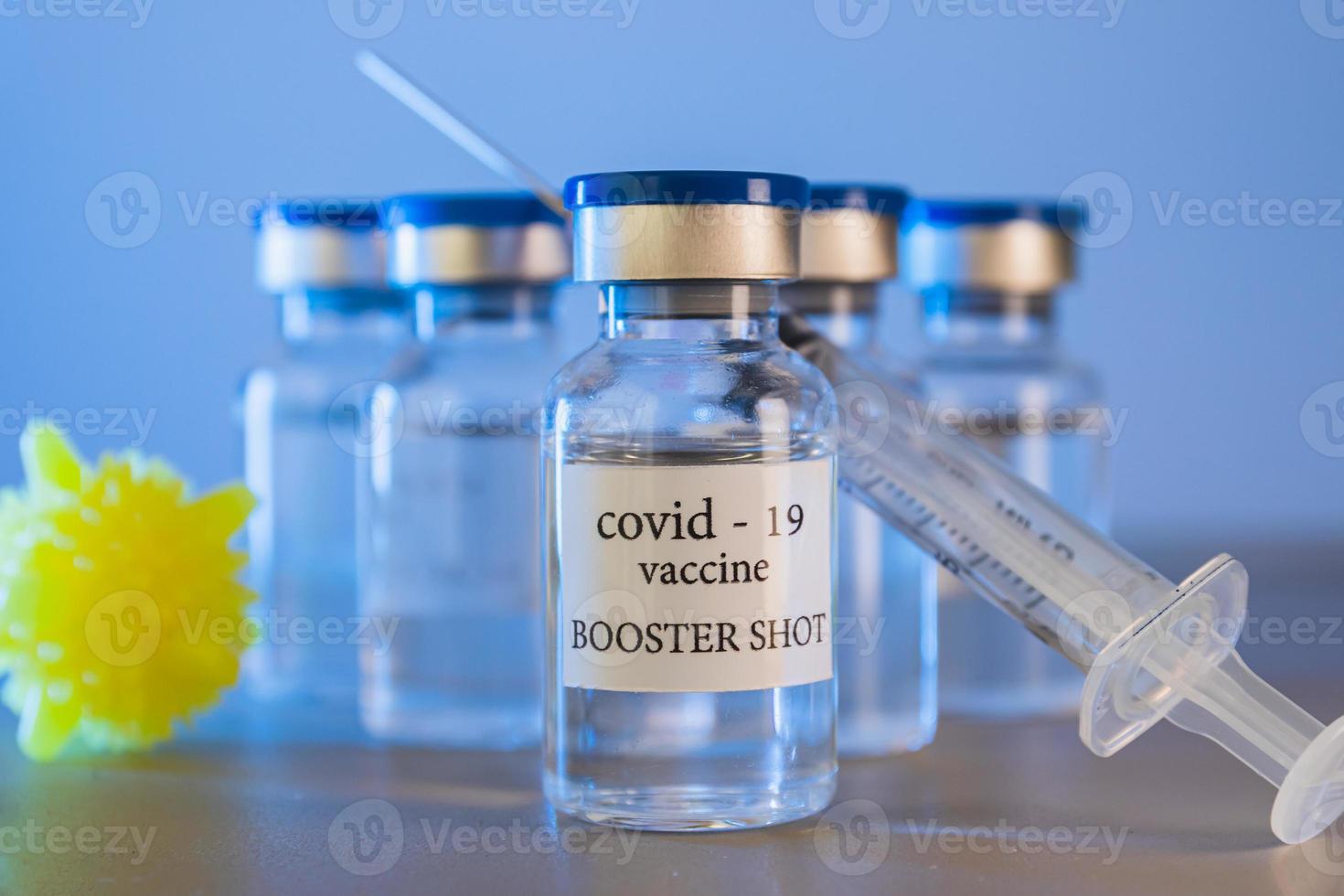 COVID-19 booster vaccine vials. Medicine and health care concept photo