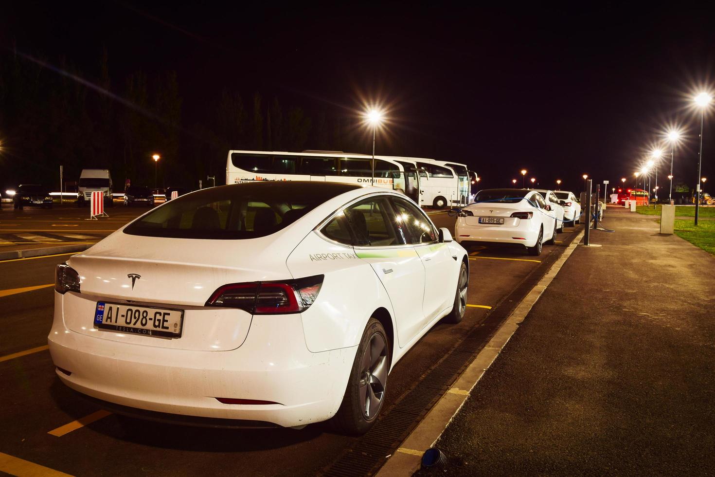 Kutaisi, Georgia - Tesla electric cars used for taxi service airport to city transfer photo