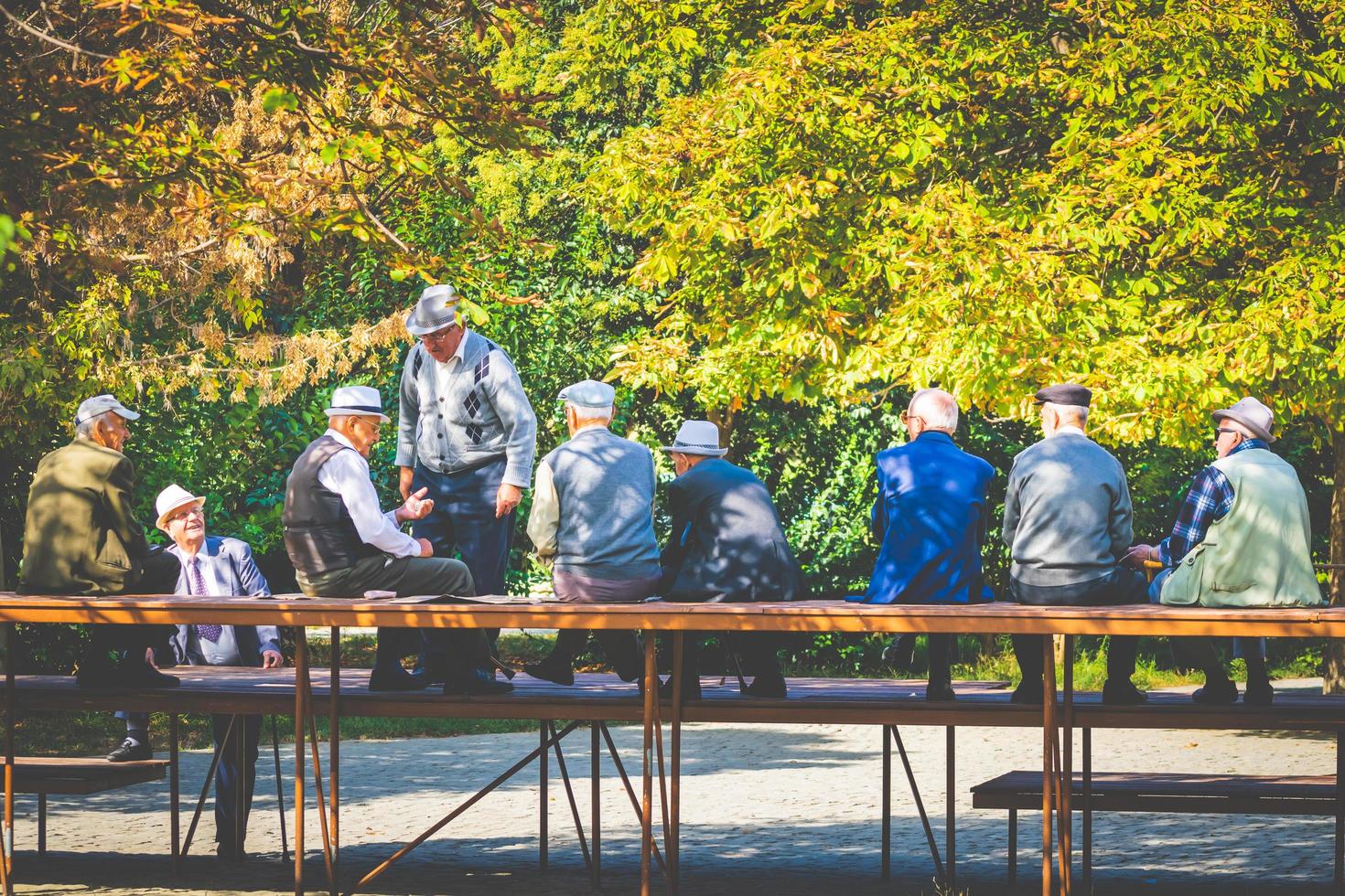 Albania, September, 2018-Senior men sitting in the park photo