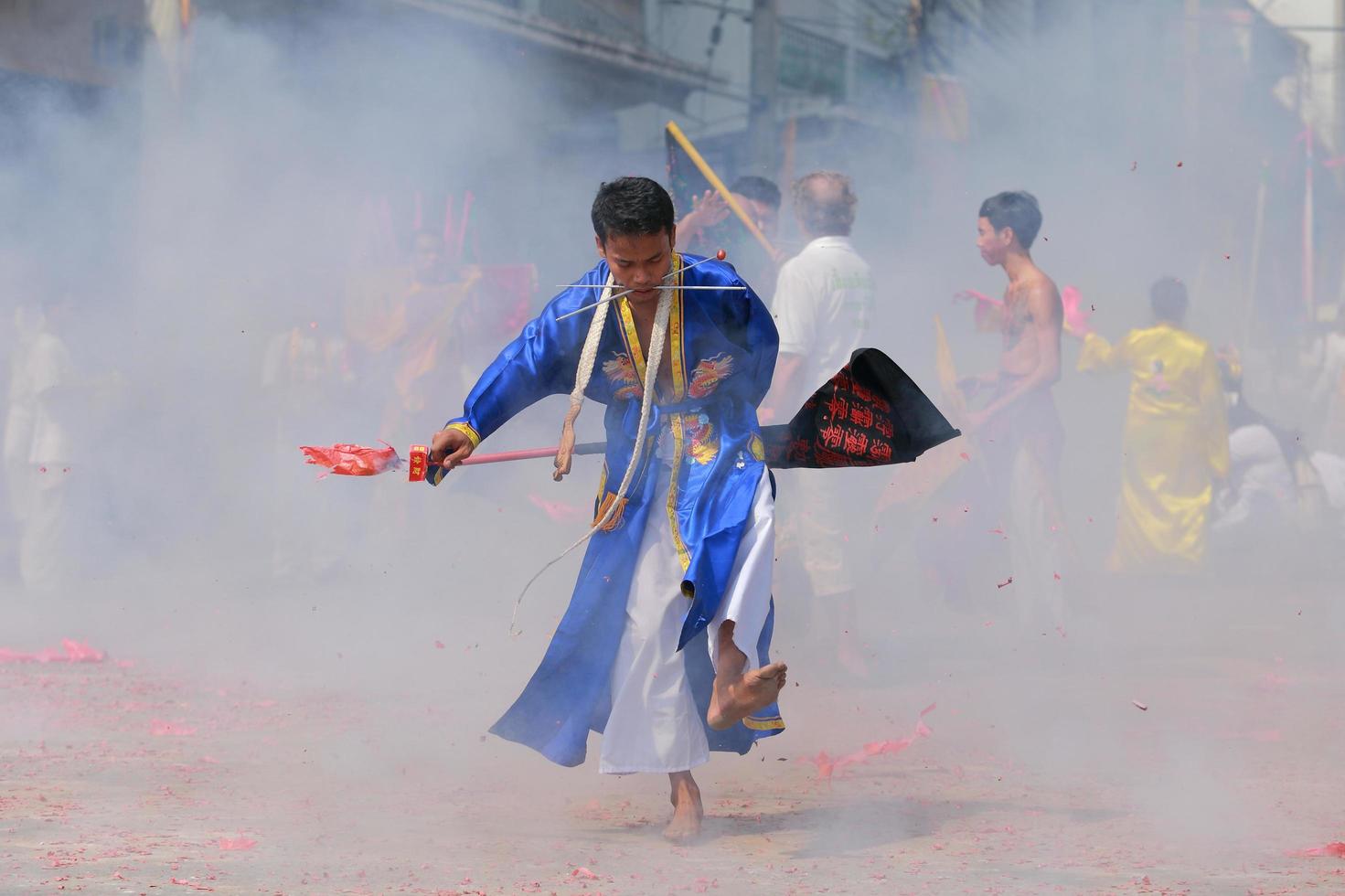 Korat, THAILAND - OCTOBER 27 Unidentified devotee of Vegetarian Festival, person who invites the spirits of gods to possess their bodies on October 16, 2015  in Korat, Thailand photo