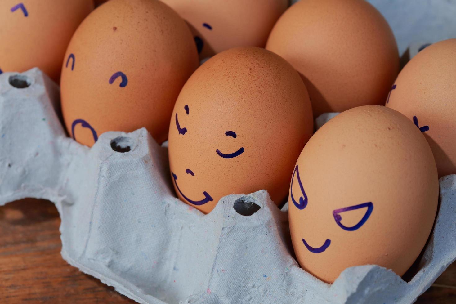 Emotion of fresh eggs  on a straw. photo