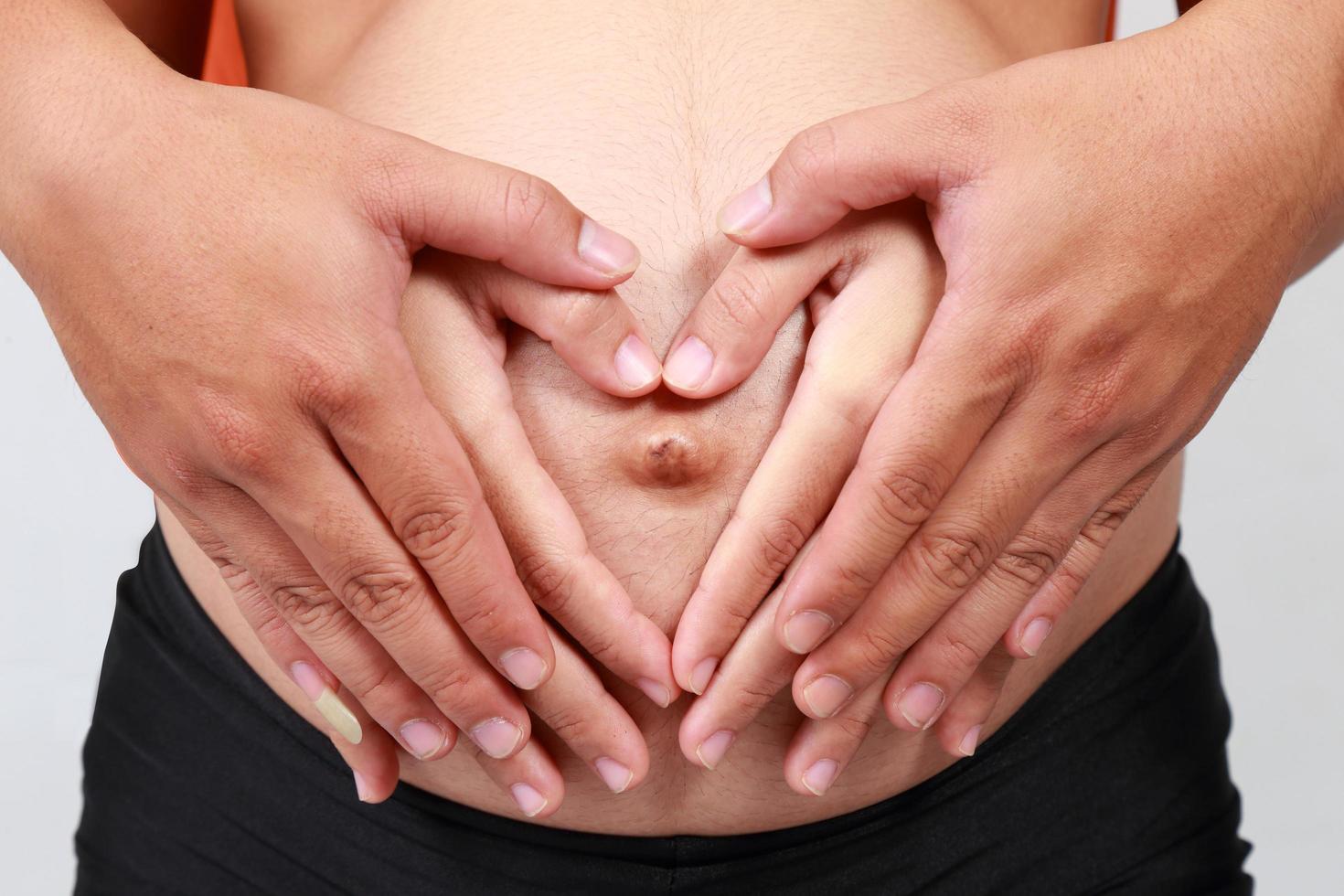 pregnant woman  white background. photo