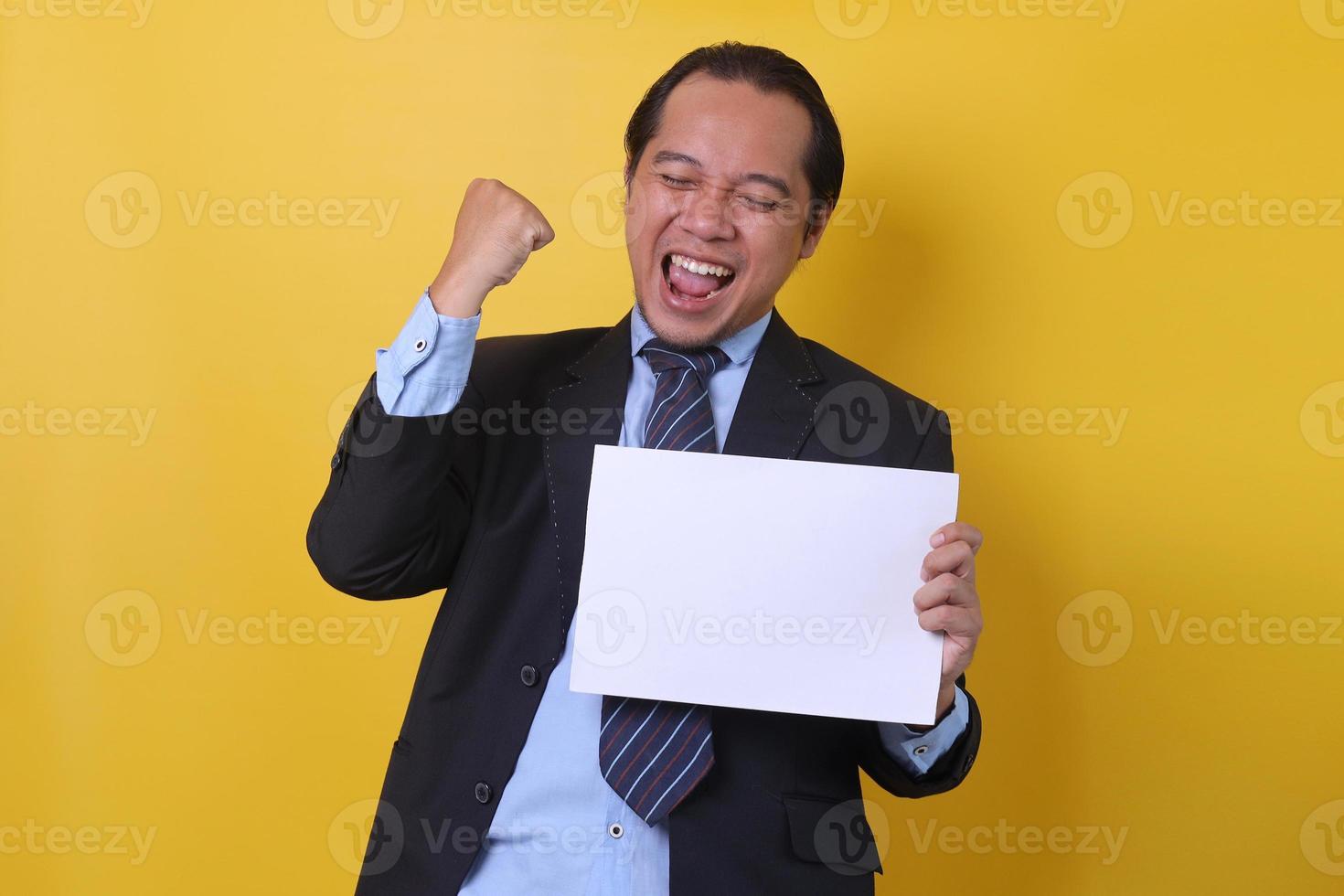 Attractive Asian businessman celebrating success and throwing papers, yes man, success team concept after sign contract photo