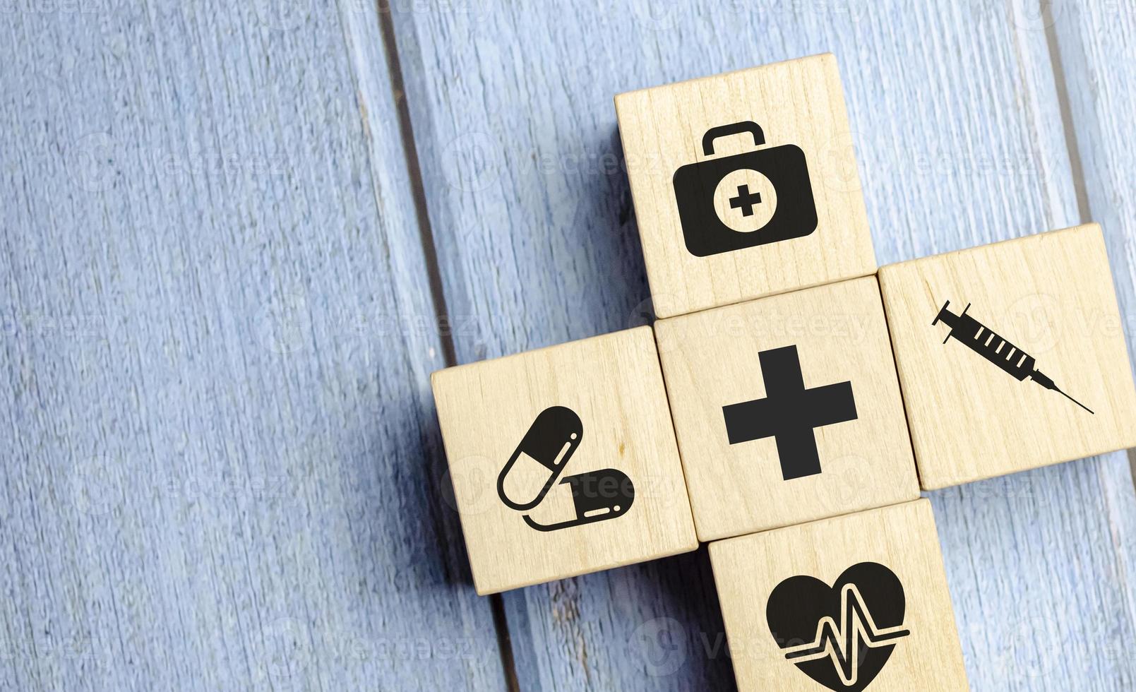 wooden block arrangement with healthcare medical icons Maintenance photo