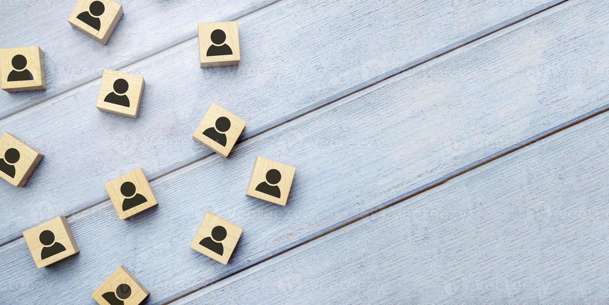 Wooden blocks on blue background. Teamwork, network and community concept. photo