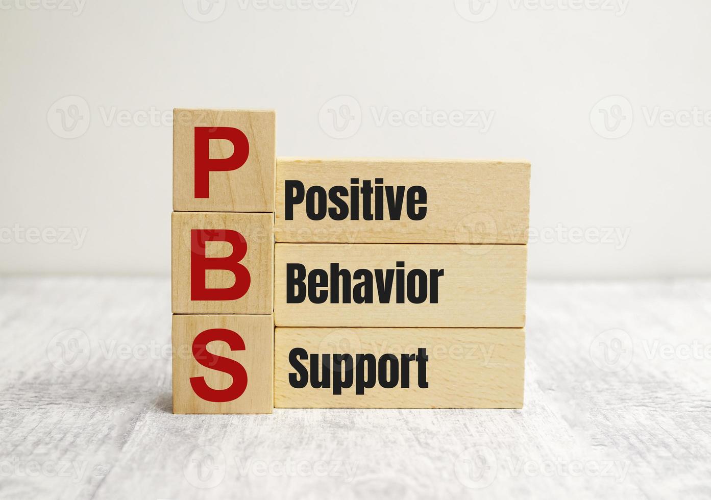 Positive behavior support symbol. Concept words Positive behavior support on wooden blocks on a beautiful white background photo