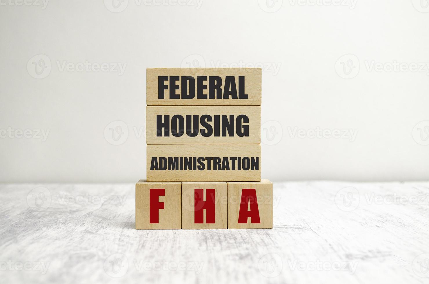 FHA word written on wooden cubes with copy space photo