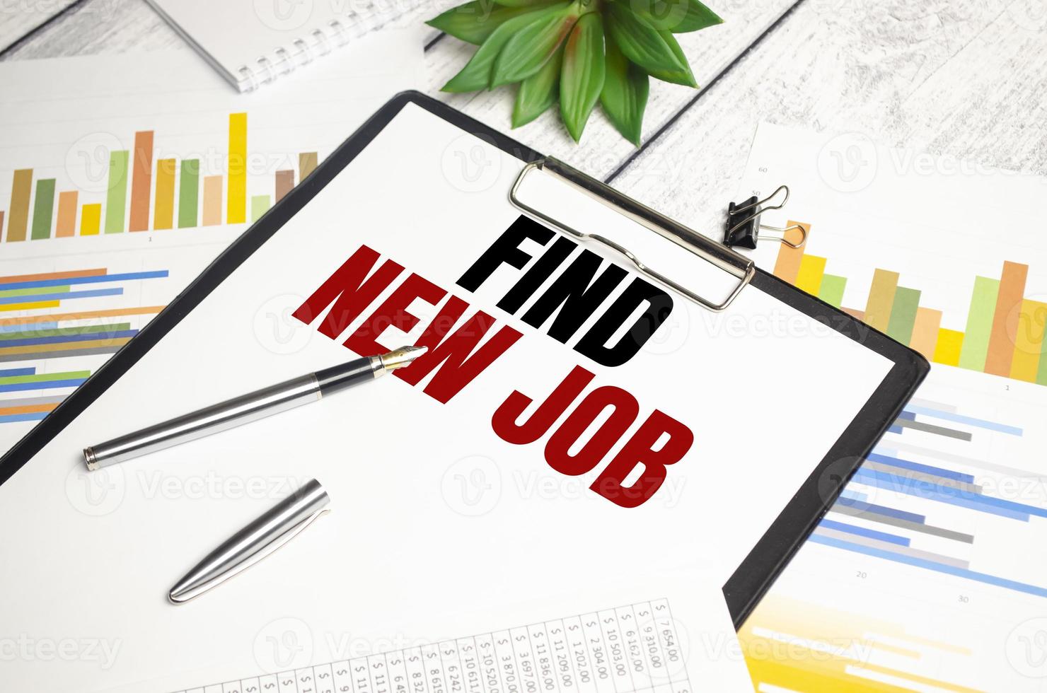 Paper with text Find New Job on the table on the chart photo